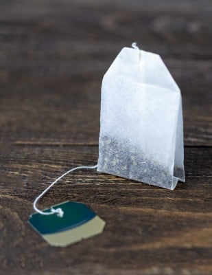 A bag of peppermint tea sitting on a countertop
